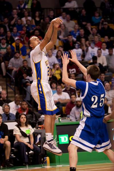 Jordan Rezendes shoots a jumper over the Bedford defense in Wareham's win over Bedford at TD Garden on Monday. BY ANDREW W. GRIFFITH